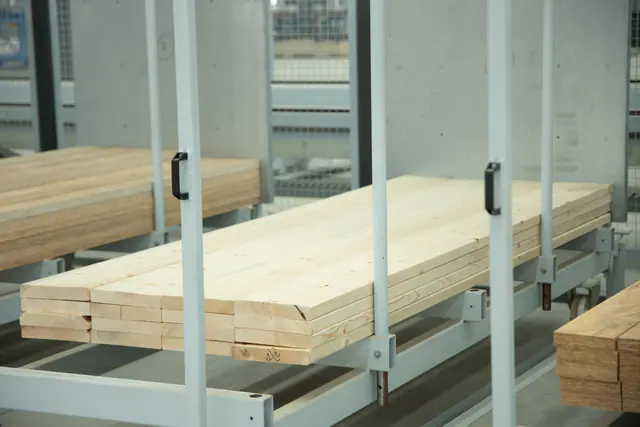 Prepared timber components in factory storage
