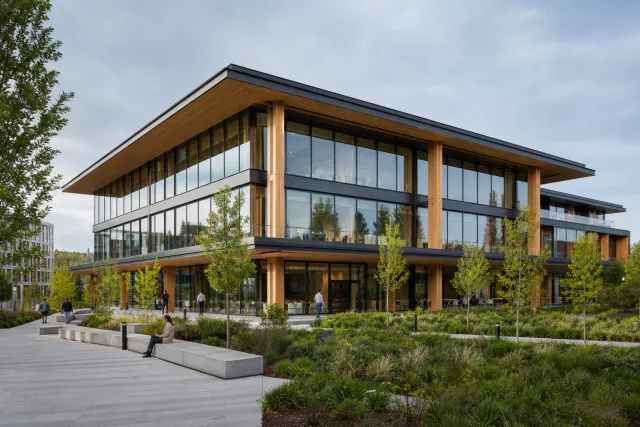 Engineered timber hotel beside a lake