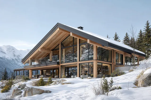 Contemporary timber villa in an Alpine landscape